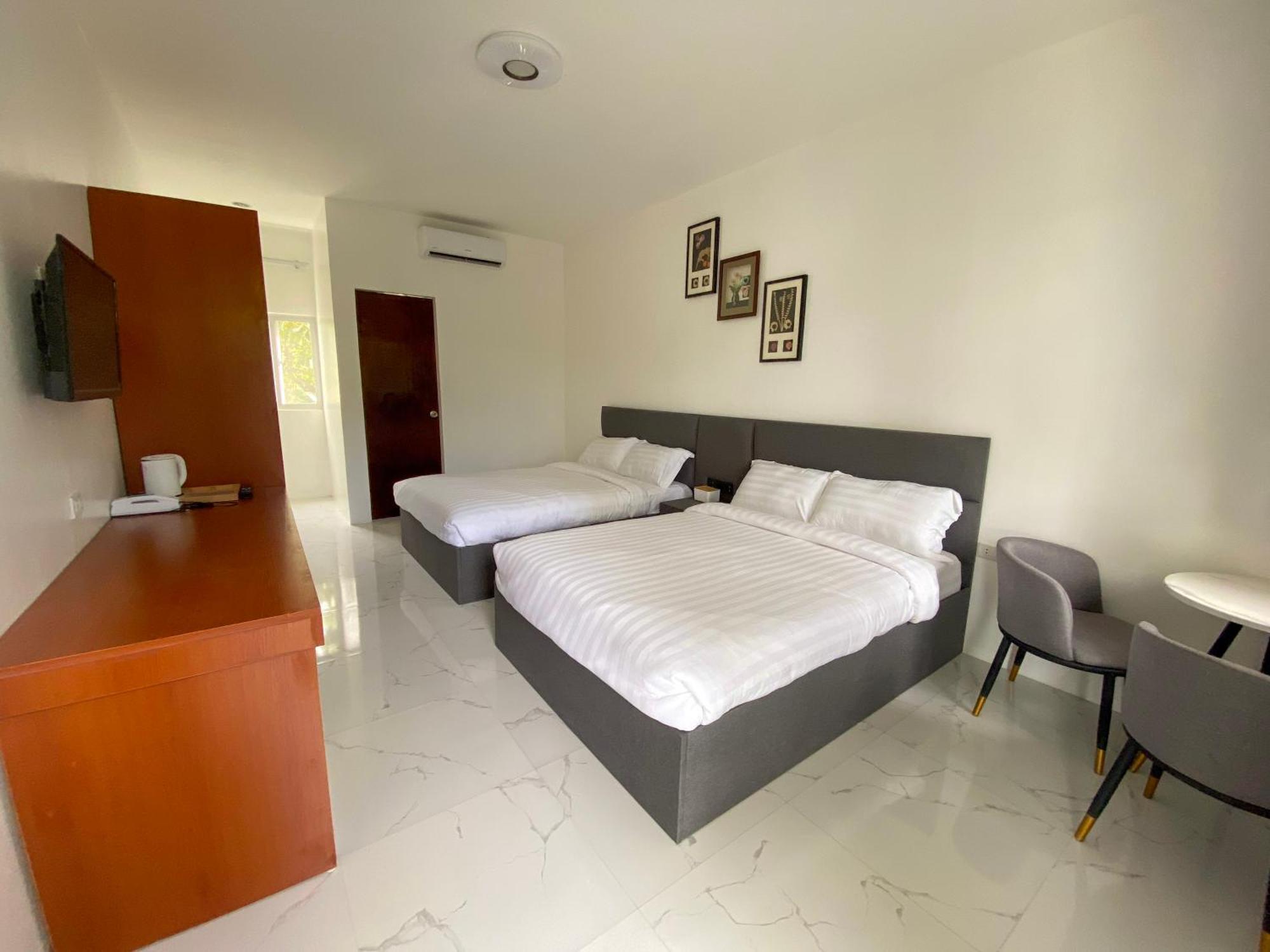 Q Beach Resort Cabangan Værelse billede